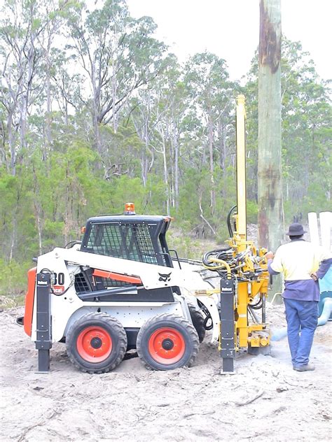 rock drill attachment skid steer|drilling rig attachments for bobcat.